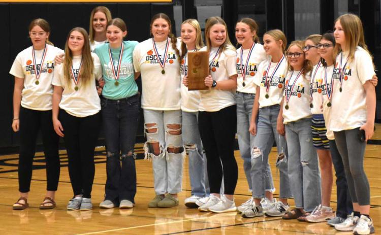The Osceola Junior High girls’ volleyball team won CRC by beating BDS in York. They were recognized at Osceola’s last home game last Friday. The team is coached by Nicci Kropatsch. PCN photo by Beth Sparrow.