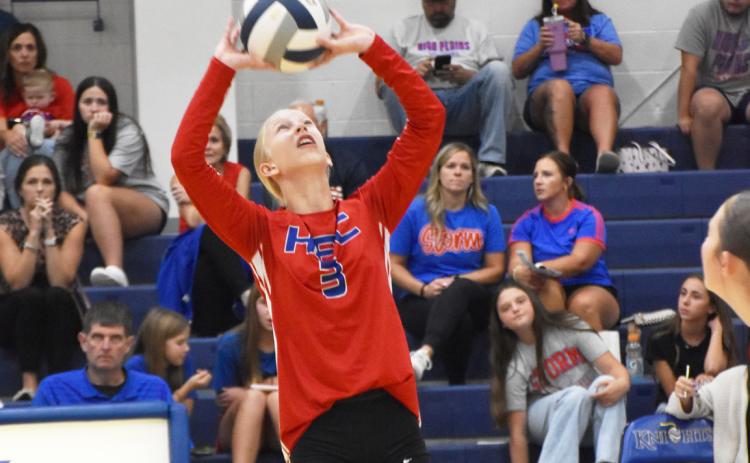 Top- Freshman setter Josie Spurling sets up the offense in the Storm’s season opener at Nebraska Lutheran. Above- Senior HallieJo Urkoski looks for the tip winner against Lutheran. PCN photos by Beth Sparrow.