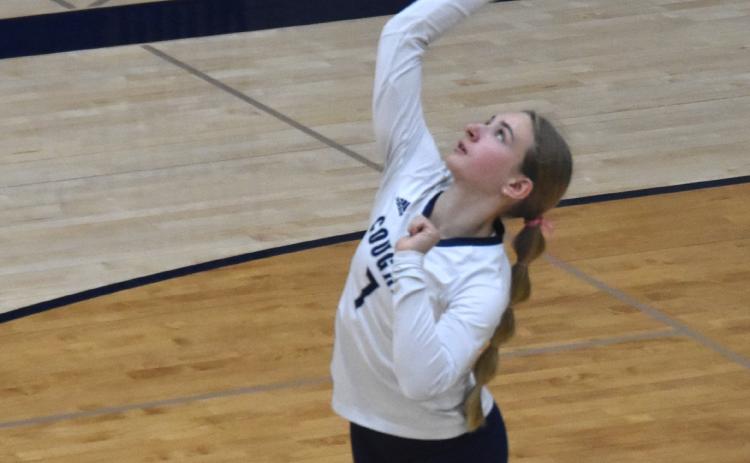 Finley Peterson serves the ball against Dorchester; she had two ace serves in the contest. PCN photo by Kirk Sparrow.