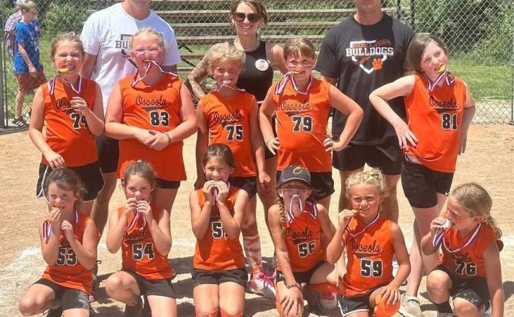 Top-The Osceola 8-U girls softball team placed first at the 8-U Sliders League Tournament. Photo provided.