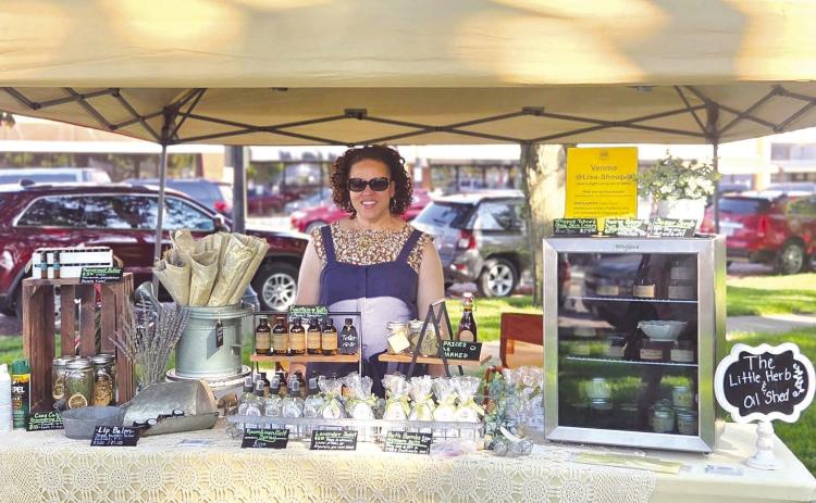 Above: Recently Lisa Shoup had her products at the market at First Friday. Below: Her new bug spray is available. Photos provided.