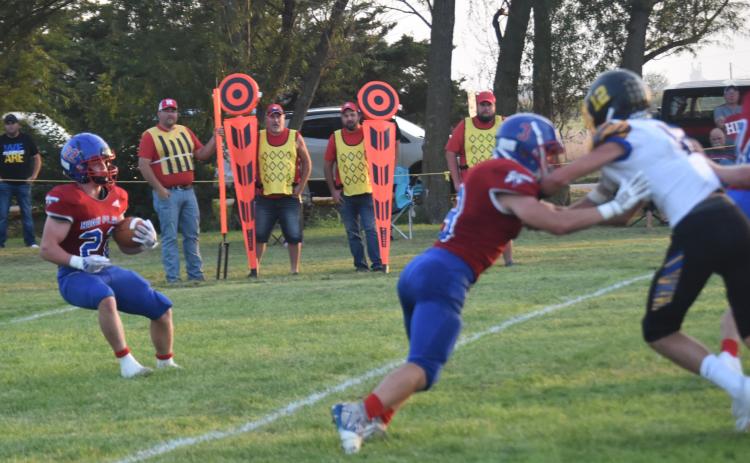 Gage Friesen gets ready to run the football, as Jacob Lesiak blocks. PCN photo by Kirk Sparrow.