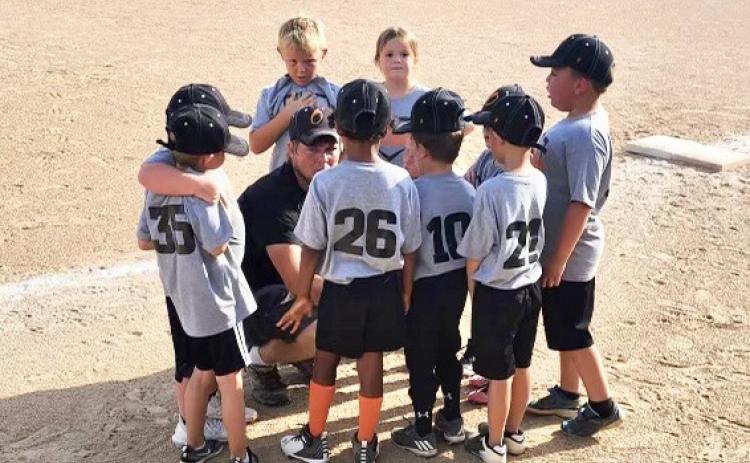 Derek Baloun is coaching tee ball to Osceola young kids. Photo provided.