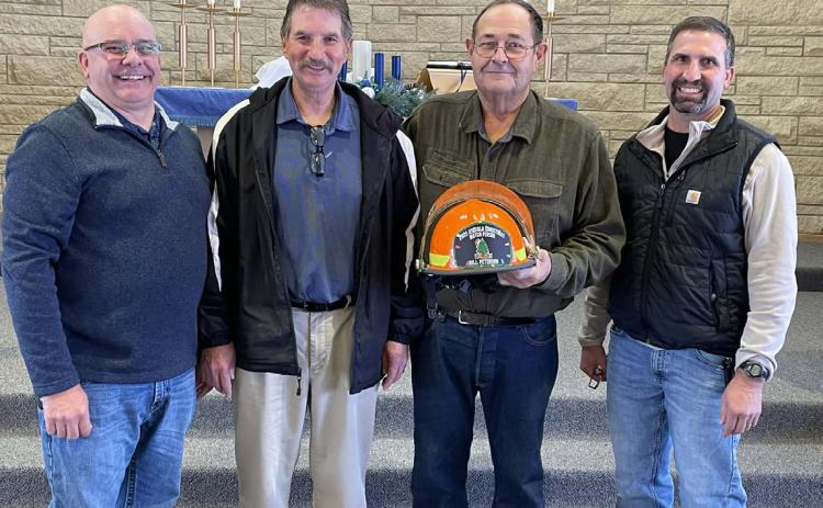 Above: Bill Peterson was chosen as Osceola’s 2025 Christmas Watch Person. Pictured are Fire Chief Toby Watts, last year’s watch person Phil Doerr, Bill Peterson and fire chaplain Justin Sunday. Photo provided.