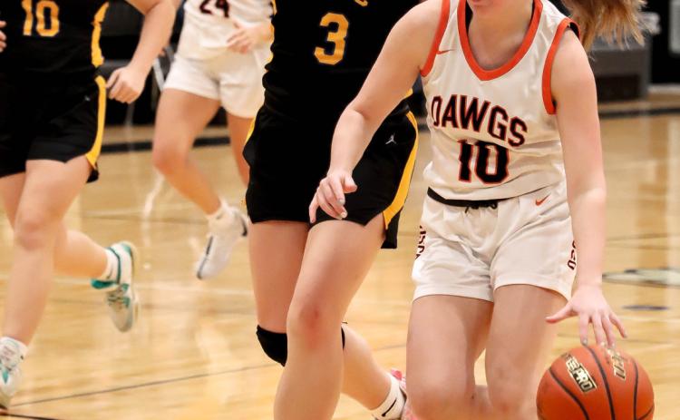 Ava Larmon (SRC) guards Addison Theis (OSC) as she take the ball down the court. PCN photo by Blaine Winslow.