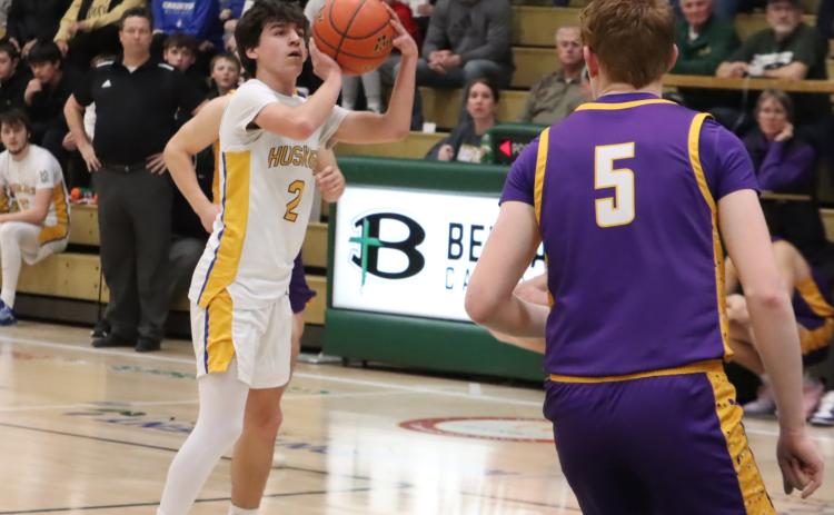 SRC junior Noah Thelen knocked down six first half three-pointers and finished with 33 points as the Huskies advanced in the C2-2 tournament with an 86-78 OT win over Tekamah-Herman. PCN photo by Ken Kush