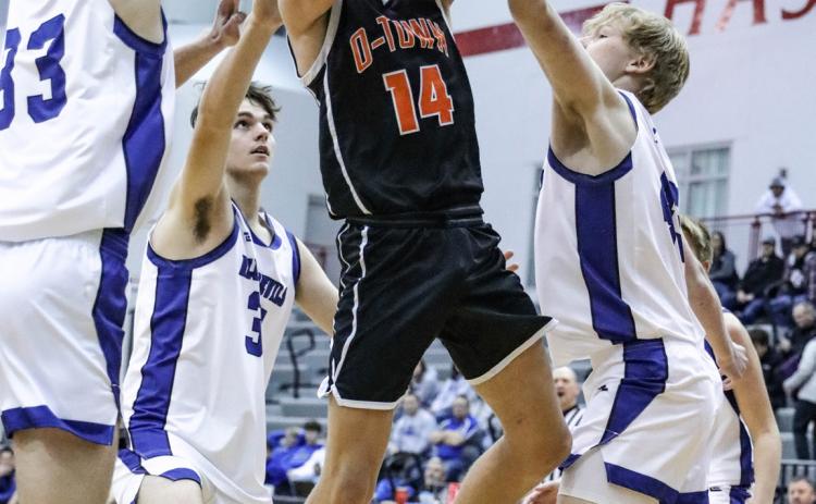 Landan Drozd pulls down a rebound against Kenesaw. PCN file photo by Blaine Winslow.