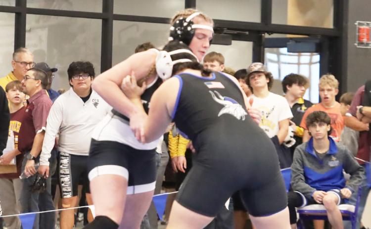 Cross County senior Ema Dickey competes in her first ever high school wrestling match. PCN photo by Ken Kush