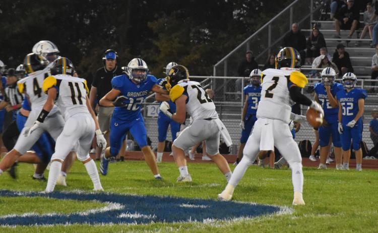 Logan Lindsley looks for a receiver to pass. PCN file photo by Beth Sparrow.