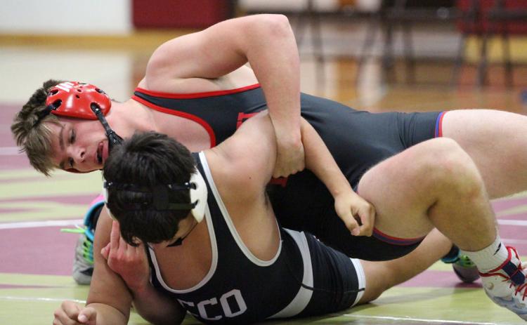 Wyatt Urkoski (HPC) wrestles Calob Troy (CCO) in the triangular at East Butler. PCN file photo by Travis Lane.