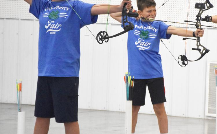 Above left: In archery, Sawyer Mundt and Fischer Johnson got purples with Johnson as grand champ in jr. traditional and Mundt reserve champ.