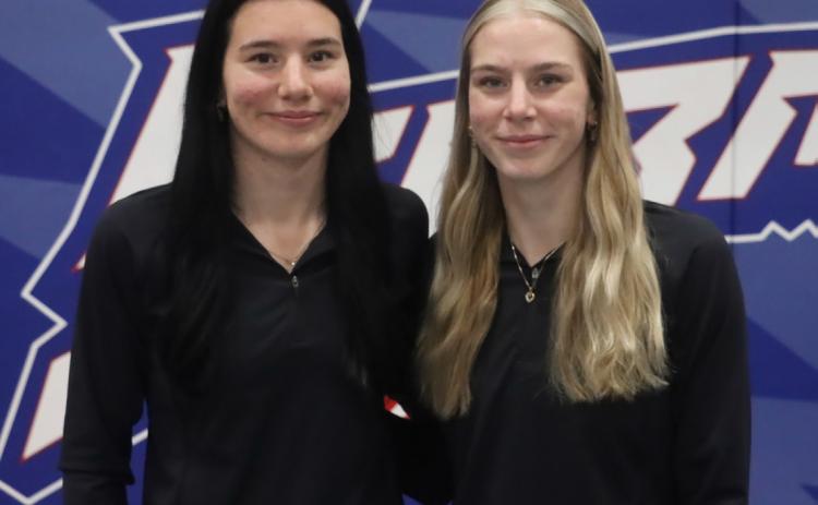 High Plains girls wrestling team members are sisters Dakota Gress, a senior and Bailey Gress, a junior. Both wrestlers hope to get back to state against this season. PCN photo by Ken Kush.