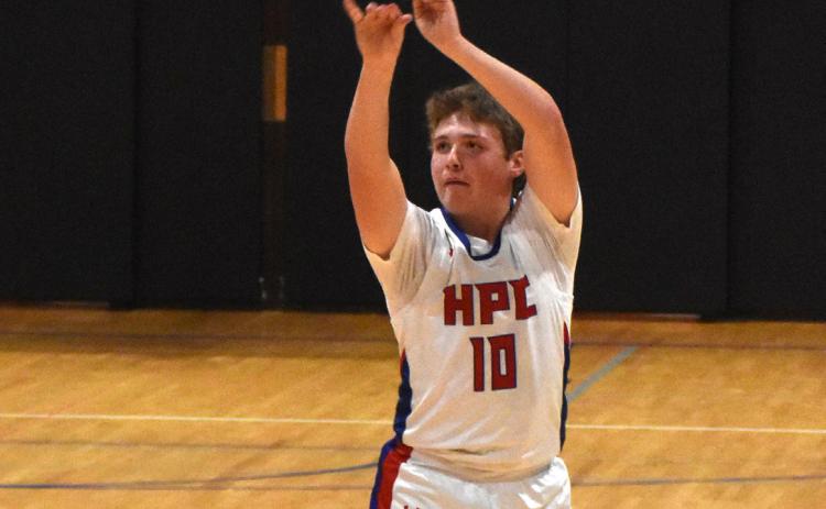 Chase Owens attempting a three pointer. PCN photo by Beth Sparrow.