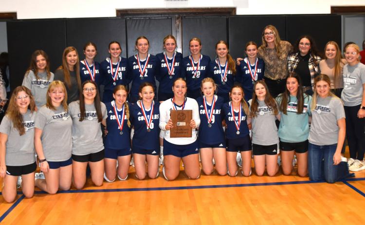 Above: Cross County volleyball finished runner up at the Crossroads conference tournament on Tuesday night. PCN photo by Beth Sparrow. Below: Seniors Lilly Peterson (left) and Shyanne Anderson (right)