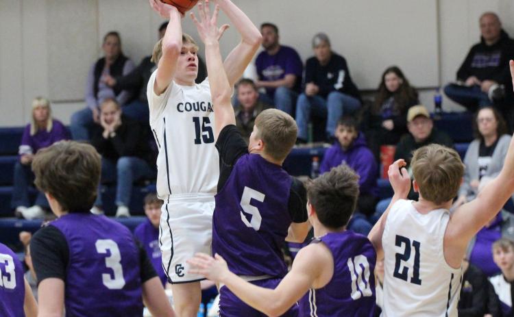 In his final high school basketball game, Cougar senior Sawyer Anderson poured in 27 points, but the No. 1 seed CC boys came up short losing to Wood River 67-62 in over time. PCN photo by Travis Lane.