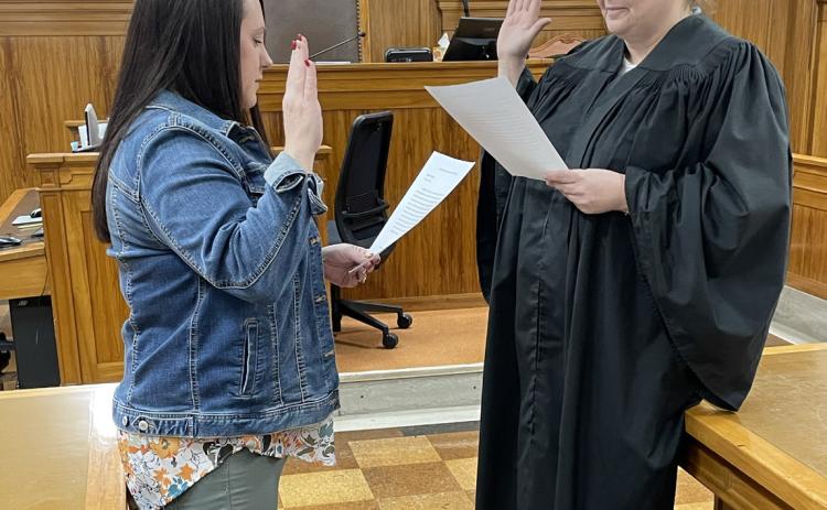 Above: Shauna Drozd was sworn in as County Treasurer on Monday by Clerk Magistrate Jodie Roberts. She takes over after Barb Swanson retired on Friday. Photo provided.