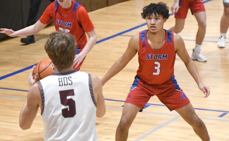 Mario Lesiak (right) looks to keep the Eagles offense on their heels in their first round matchup. PCN photo by Rick Holtz