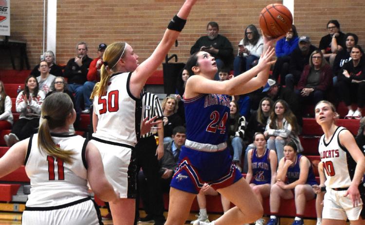 Rylee Ackerson takes the ball to the basket. PCN photo by Beth Sparrow.