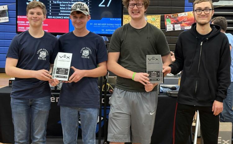 Team 5155K (right) qualified for state robotics on Saturday winning the tourney with 5155E (who was already qualified). Pictured is (left to right) Sam Haug, Marshall Johansen (5155E) and Cannen Mooney, Kirk Sparrow (5155K). PCN photo by Beth Sparrow.