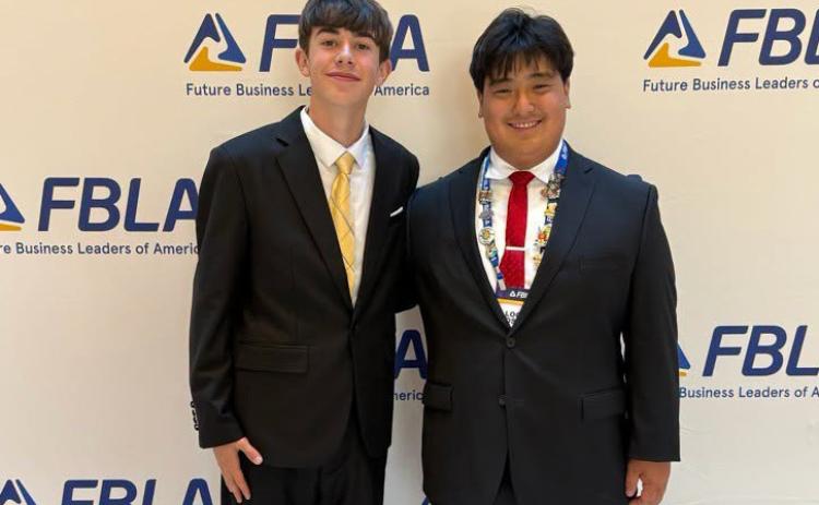 Garrett Ruth and Logan Pospisil (pictured) represented Shelby-Rising City at National FBLA in San Antonio, Texas. They competed, networked, and explored over one week—SeaWorld, the Alamo, countless walks along the River Walk to and from the convention center, and plenty of other adventures along the way. It was a week full of learning, laughs, memories, and lots of Texas heat! Mrs. Sara Jensen went along as their sponsor. Photo provided.