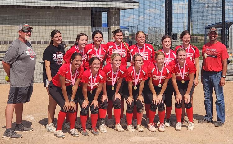 The Polk County Slammers took home the medals placing first at the York Fusion softball tournament over the weekend. Photo provided.