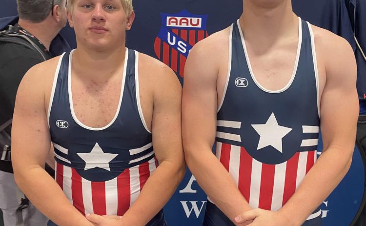 Eli Fjell and Coy Vrbka from Shelby-Rising City competed this weekend in Florida at Disney duals with the AAU Nebraska Captain team. Photo provided by Kelsey Vrbka.