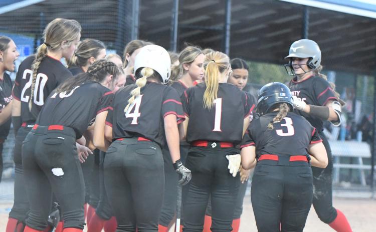 Slammers gather to celebrate a run at subdistricts. PCN photo by Rick Holtz.