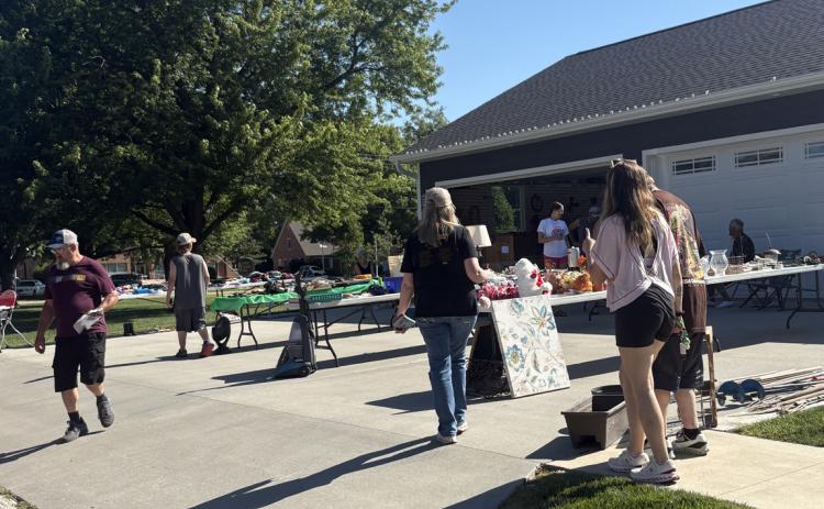 Above: Over 30 garage sales brought people to Stromsburg to find bargains. There was also food trucks, a shred truck and Goodwill semi trailer. PCN photo by Beth Sparrow.