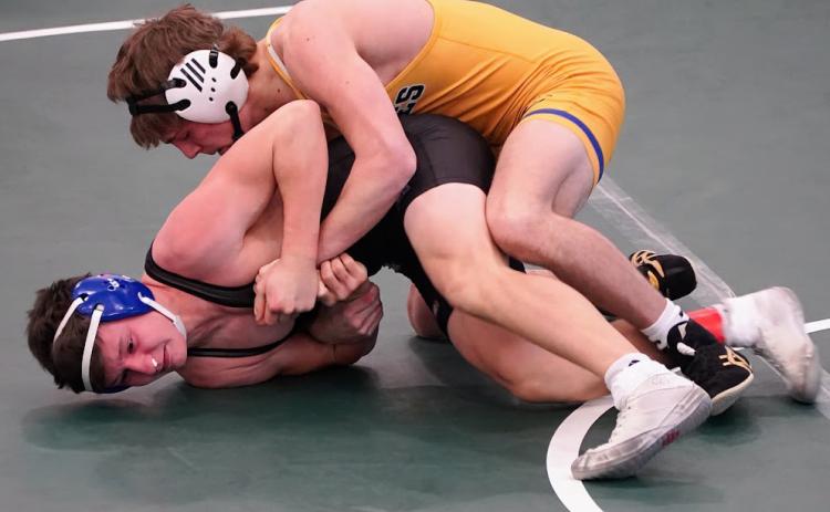 Carter Eickmeier wrestles an opponent at the Schuyler invite; he placed fifth. PCN photo by Jen Vrbka.