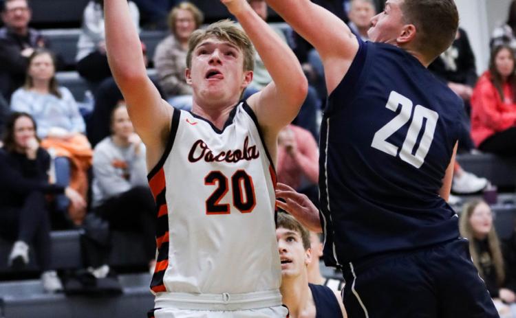 Braxton Mestl (OSC) tries to score while Brock Allen (CC) defends. PCN photo by Blaine Winslow.