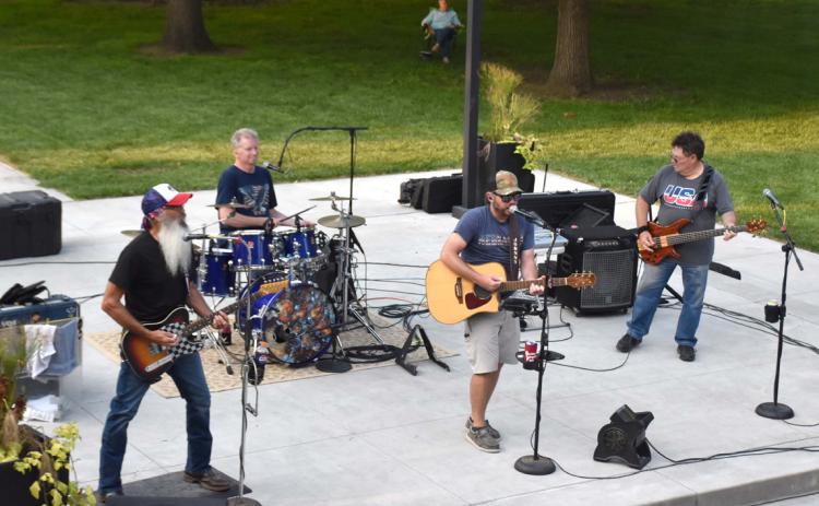 The band Silas Creek entertained Friday night to a good crowd in Stromsburg. They played mostly 90s country songs while people shopped the market, grabbed a meal, played cornhole or just sat and listened. PCN photo by Beth Sparrow.