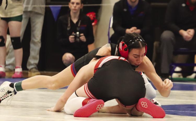 High Plains Plains senior Dakota Gress works for position during the B-2 Distreict Wrestling Tournament at Columbus Lakeview on Friday. She finished second at 125. PCN photo by Ken Kush