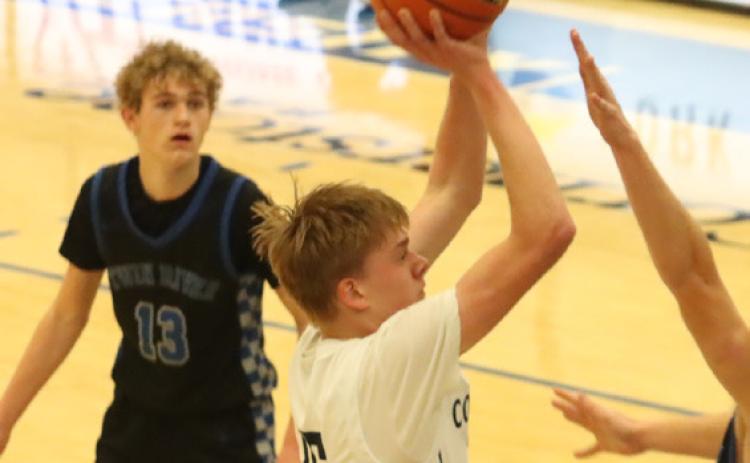 .Cross County senior Sawyer Anderson was the area’s leading scorer as he put up 16.1 points per game and pulled down 5.2 rebounds. He also led the Polk Co. area in assists at 5.3, he was fifth in FT shooting and sixth in steals. PCN file photo by Ken Kush.