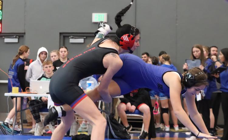 High Plains senior Dakota Gress has been the face of the Storm girls wrestling program the past four years and is looking for a third consecutive trip to the Nebraska Girls State Championships this coming February. Gress took third-place at the loaded Winnebago Invite this past Friday. PCN file photo by Ken Kush.