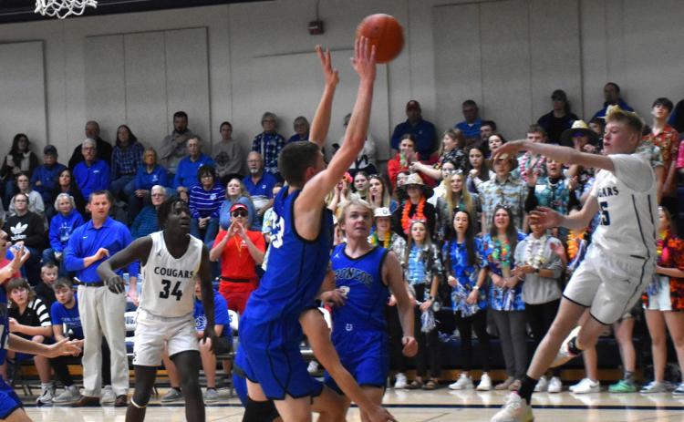 Sawyer Anderson goes for the save against Centennial. PCN photo by Beth Sparrow.