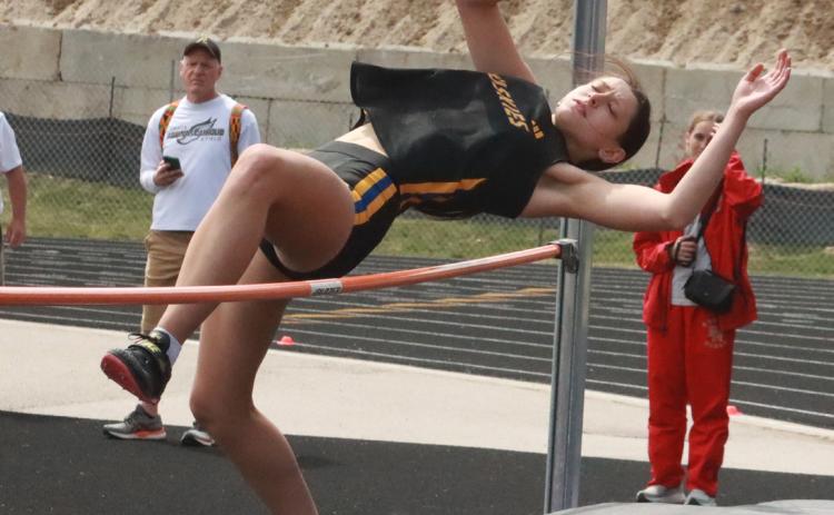 Shelby-RC senior Alexis Wetjen clears 5-1, a personal best at the C-2 District meet in Louisville. Wetjen won the event as she punched her ticket to state. PCN photo by Ken Kush.