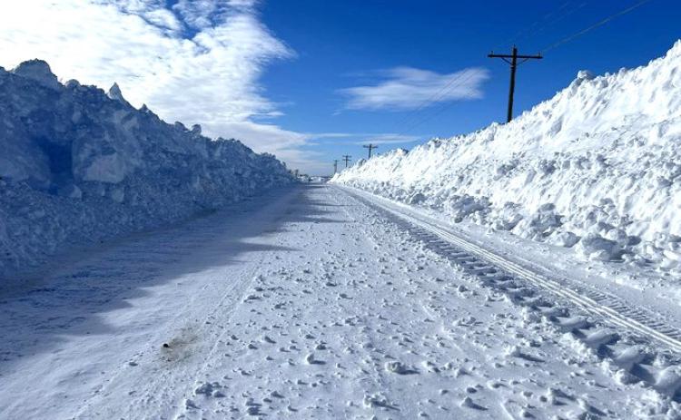 County roads like this one were drifted at least 6 feet high. Photo provided by Charles Noyd.