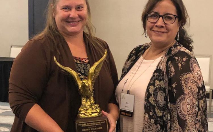 Pictured is Renee Williams with the award and the Nebraska Chapter of NAHRO President, Rita Morales from Housing Partners of Western Nebraska. Photo provided