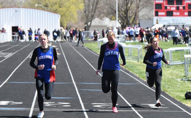 Courtney Carlstrom (HPC) finishes just ahead of teammate Jacey Dubas in the 100m dash. PCN photo by Rick Holtz.