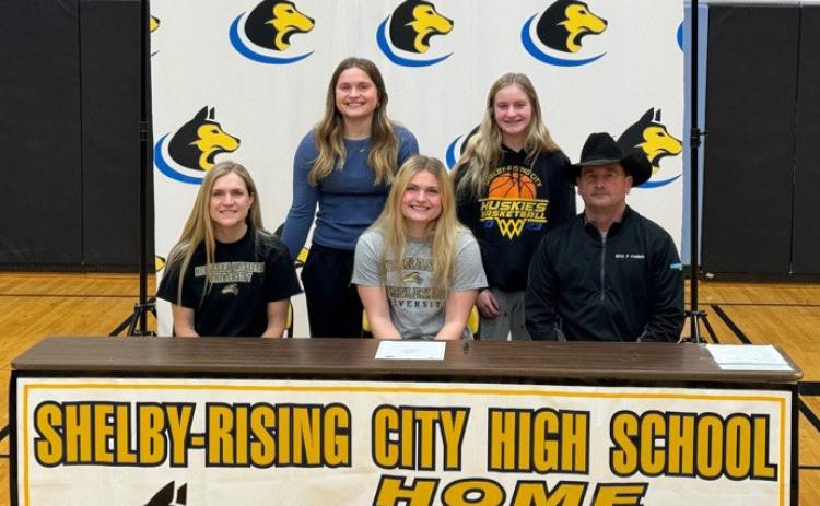 Ava Larmon signed for track and field at Nebraska Wesleyan University. Ava is pictured (center) with her family: mom, stepdad, twin sister Alex and step-sister Taya Pinneo. Photo provided.