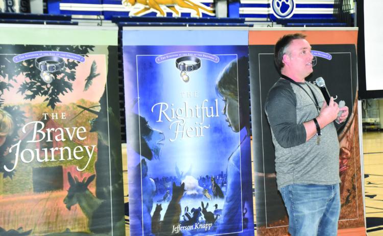 AUTHOR GIVES PRESENTATION TO COUGARS