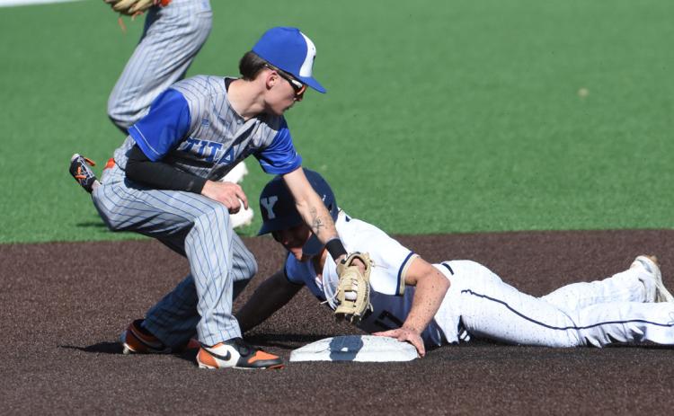 Twin River/Osceola shortstop Brayden Santos applies the tag late on the York runner during Monday’s game at Levitt Stadium. York defeated Twin River 10-1. Santos did record one of the two Titan hits. Photos courtesy of Steve Moseley.