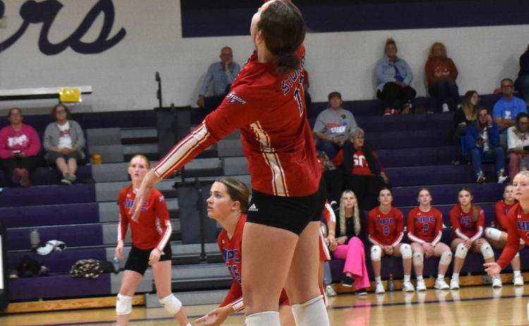 Rylee Ackerson goes up for a kill. PCN file photo by Beth Sparrow.