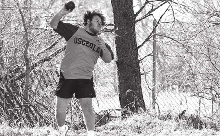 Conner Schnell throws the shot put for Osceola and posts a throw of 37’ 6”.