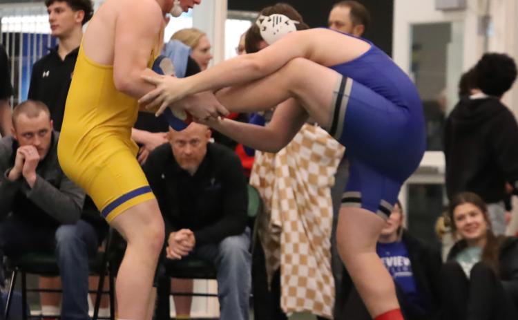 SRC’S Coy Vrbka is in control of Lakeview’s Jeffrey Coughtry in the opening round of Saturday’s Schuyler Invite. Vrbka improved to 25-0 winning the 215 pound bracket. PCN photo by Ken Kush.