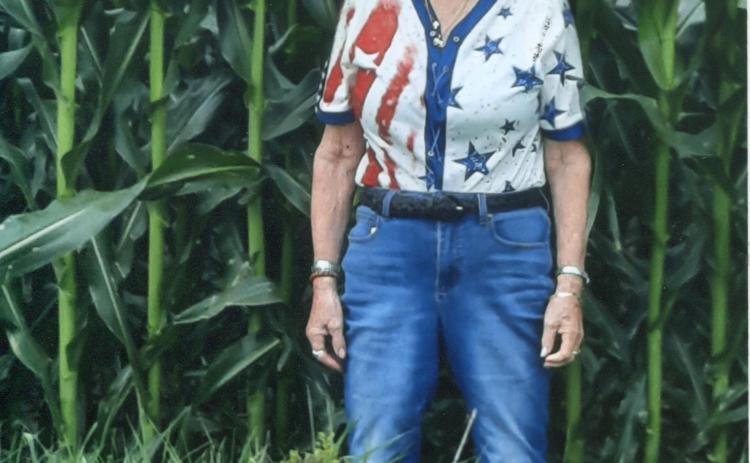 “Knee High by the Fourth of July” was my grandfather’s saying back in the early 1950s (remembers Bill Thompson, former owner of The Polk County News). The saying meant cornstalks should be knee high by the 4th of July. Pictured on July 4, 2026 is Jan Thompson at a cornfield along Highway 81 between Stromsburg and York. The stalks are about 6 feet tall. What a difference 70+ years make. Photo provided by Bill Thompson.