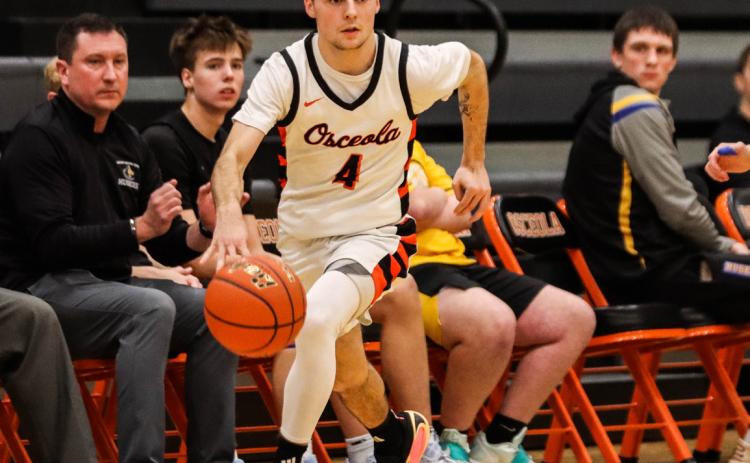 Osceola senior Brayden Santos leads the break against the Shelby-RC defense in Friday night’s game in Osceola. PCN photo by Blaine Winslow.