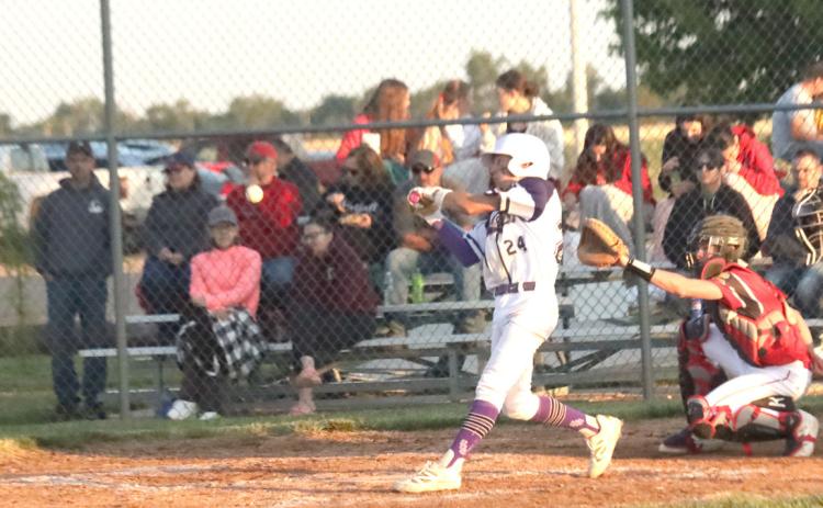 Top- Brayden Santos rips the first of his four hits in the SOS Rebels 10-7 win over Albion this past Thursday night. He also had the only hit in the loss to Valparaiso. Bottom- SOS catcher Aden Feezell applies the tag on the Albion runner at home plate just late. PCN photos by Ken Kush.