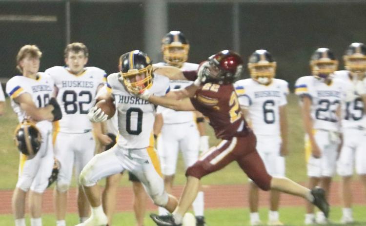 Shelby-RC Huskies senior running back Carter Eickmeier breks free on a 65-yard TD run last in the second quarter on Friday night. Eickmeier carried the ball 23 times for 179 yards and four TD’s in the team 50-29 win over Conestoga. PCN photos by Ken Kush.