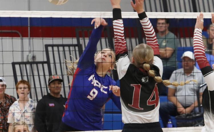High Plains’ HallieJo Urkoski (9) attacks against the Fullerton defense in Tuesday’s win over the Warriors in Polk. Urkoski finished with six kills on 14 of 18 swings. PCN photo by Ken Kush.